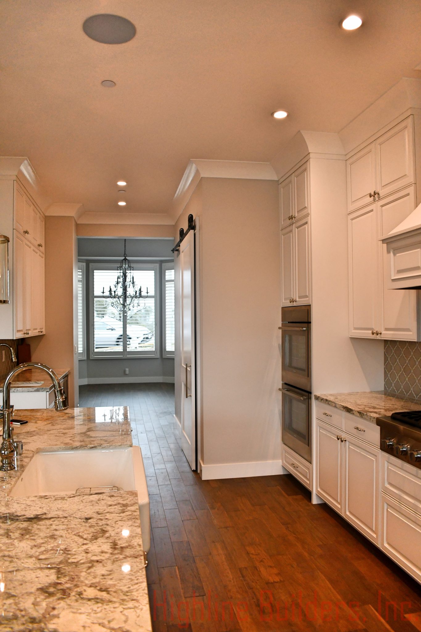 Kitchen to Dining Highline Builders, Inc.